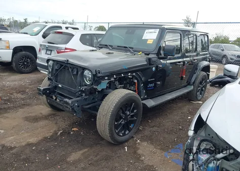 2022 Jeep Wrangler 4Xe Unlimited Sahara 4X4 z USA, uszkodzony, nr VIN 1C4JJXP62NW233306